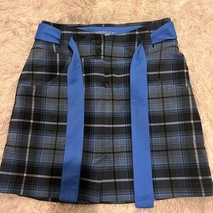 Nike Women’s golf skirt with built in shorts underneath. Size 0.